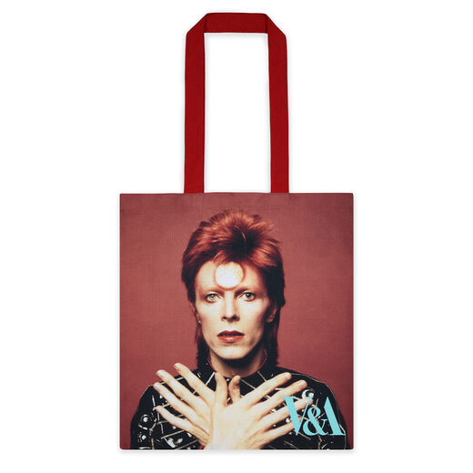 Iconic photograph of David Bowie as Ziggy stardust featured on this organic cotton red tote bag with turquoise inner lining 