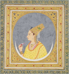 Portrait of a lady holding a lotus petal