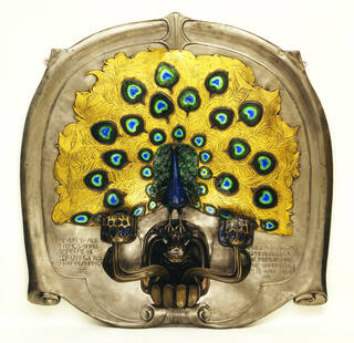 sconce in the design of a peacock