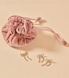 Curated gift sets Jewellery set including a pink velvet pouch and matching diamonte earrings and necklace.